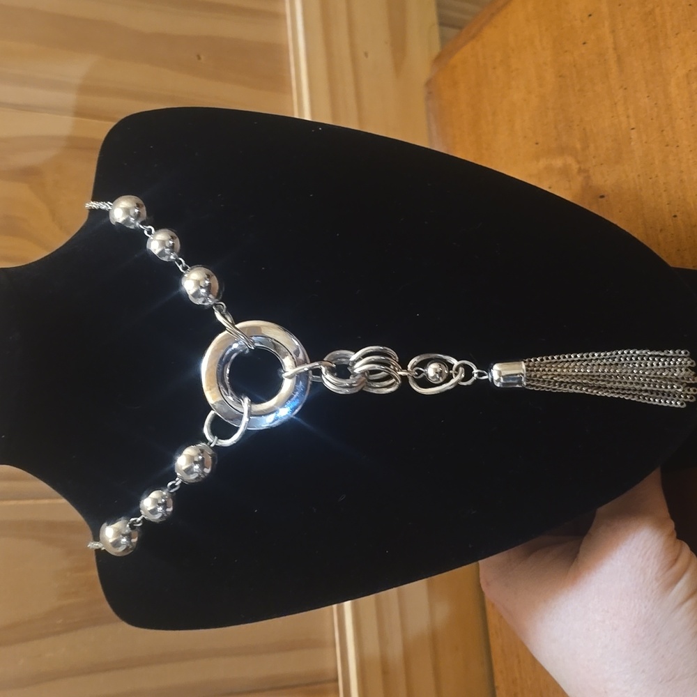 Long silver color necklace